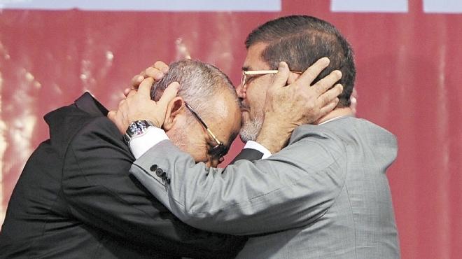محمد مرسي ومحمد بديع