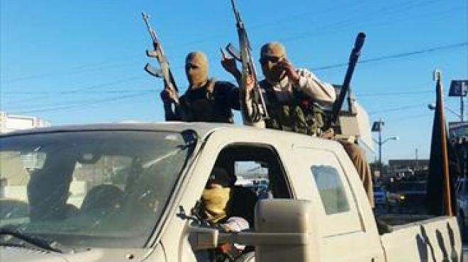  قوات «داعش» أثناء الاحتفال بإعلان «الخلافة» 