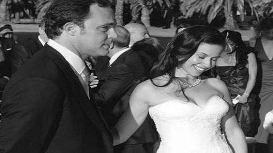 ريا أبي راشد تحتفل بعيد زواجها الثامن بنشر صور زفافها لأول مرة
