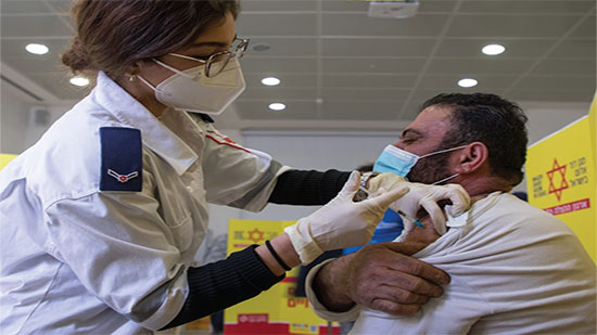 تطعيم 100 الف عامل فلسطيني ضد فيروس كورونا