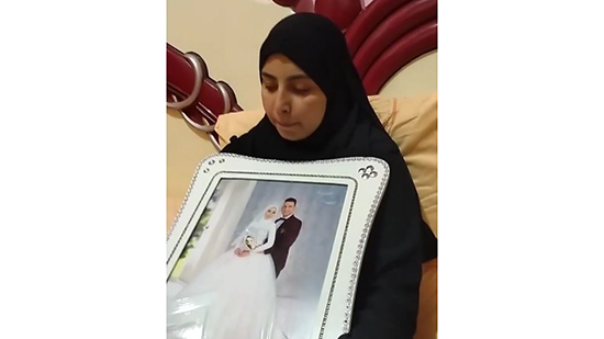 زوجة وإبن الصيدلي المقتول بالسعودية