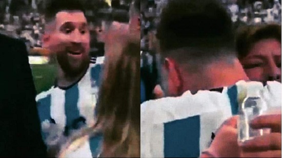 النجم الأرجنتيني ليونيل ميسي وهو يحتضن سيدة في الملعب