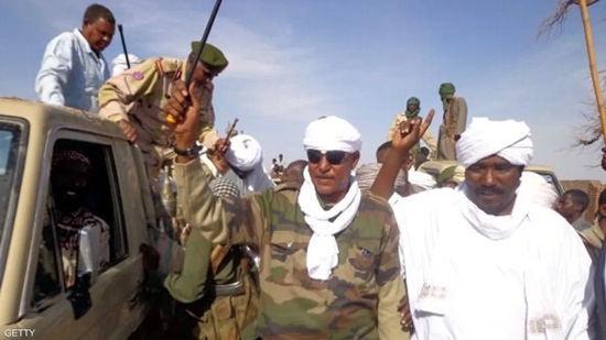 هلال (يسار) كان من أبرز مؤيدي الحكومة السودانية